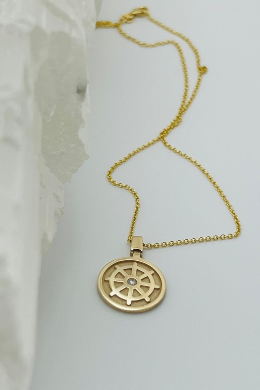 Dharmachakra Pendent set with Diamond in 14K Yellow Gold